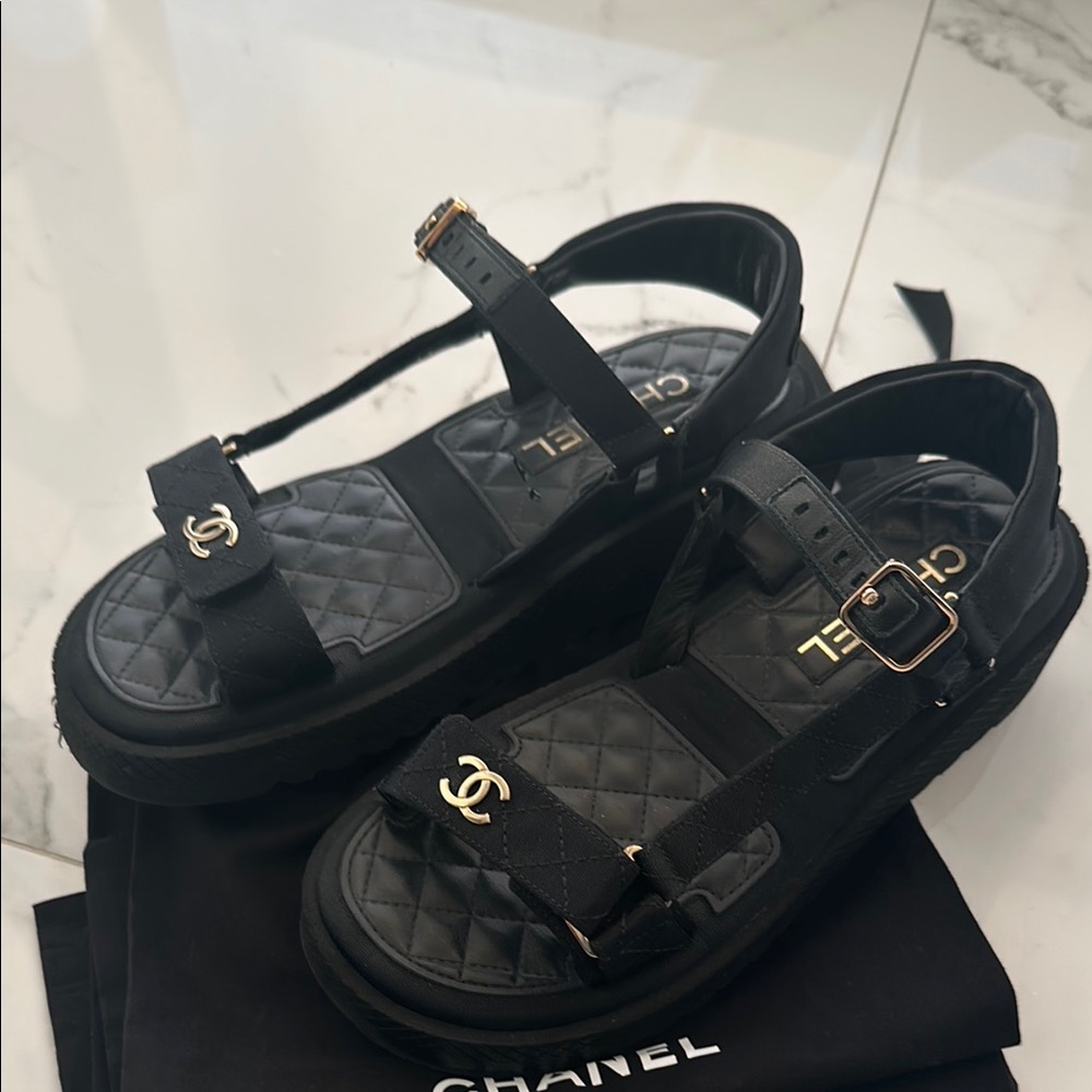 CHANEL Black Sandals with Open Toe Design and Gold Hardware